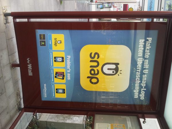 Ein U snap-Poster in der Münsteraner Innenstadt. Der Mehrwert wird nicht klar.