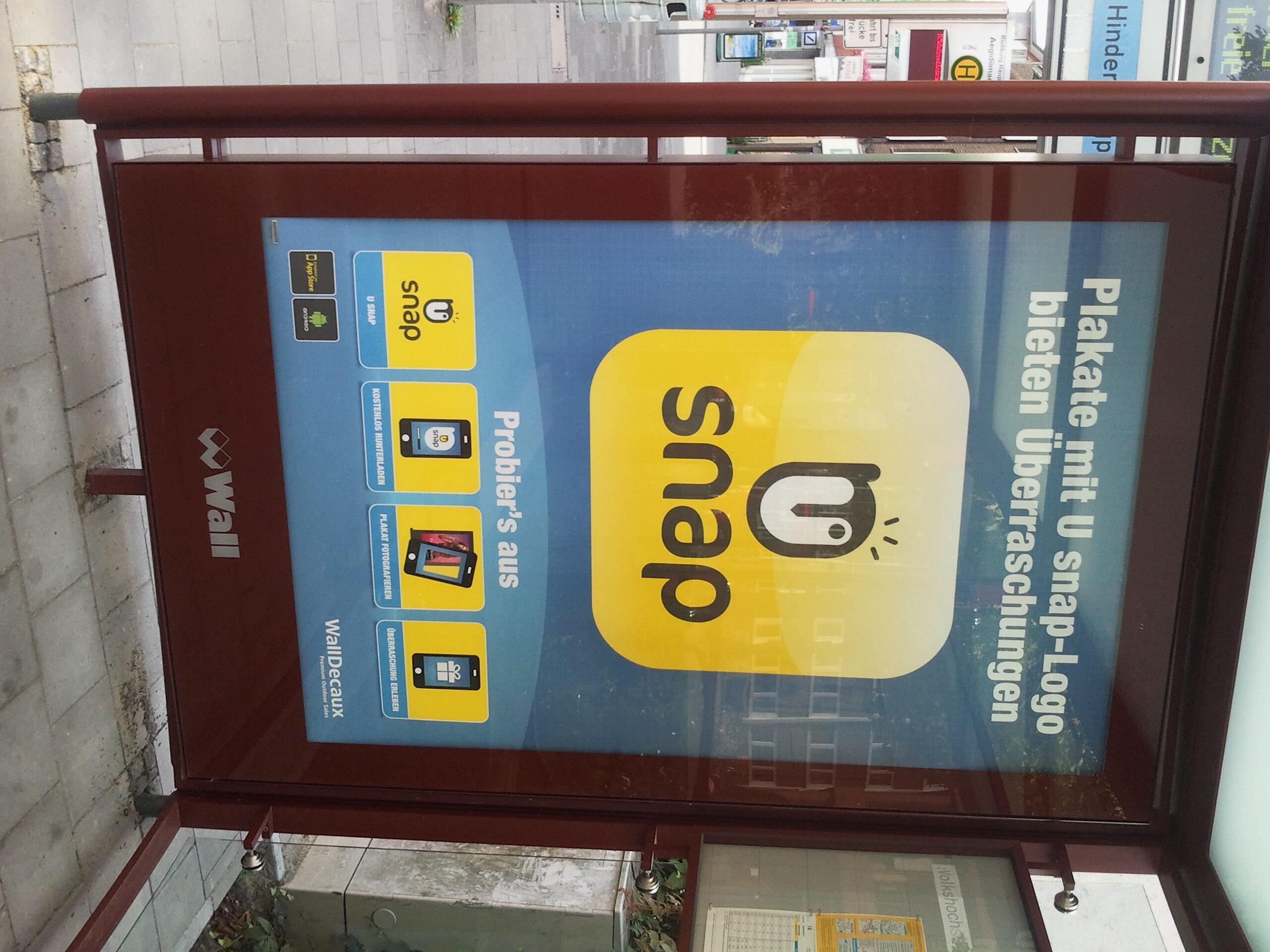 Ein U snap-Poster in der Münsteraner Innenstadt. Der Mehrwert wird nicht klar.
